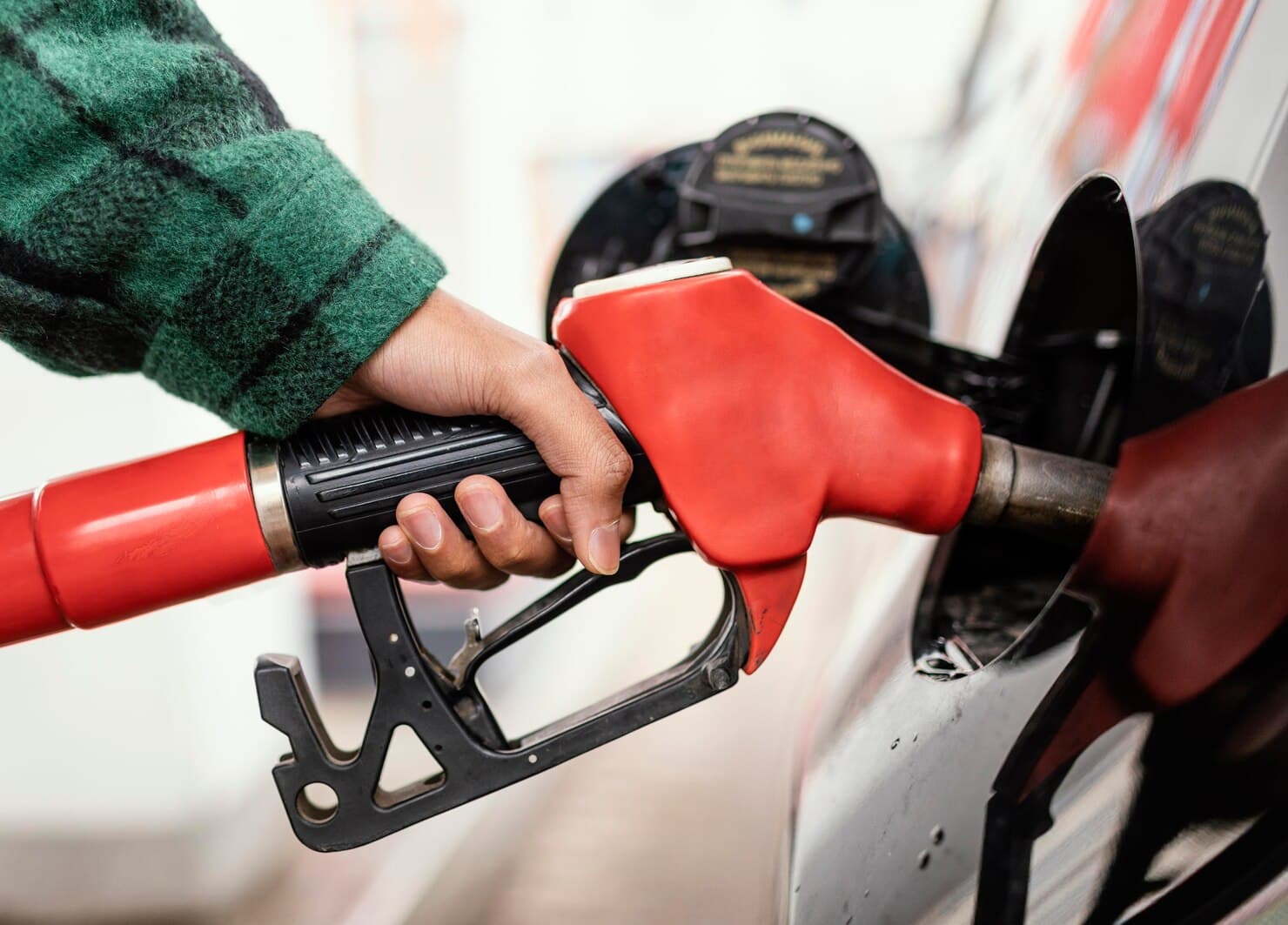 man-gas-station-with-car-close-up